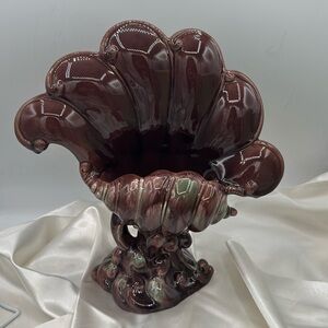 1940’s Royal Haeger vase Designed by Hickman. Vase is a flowing seashell.
